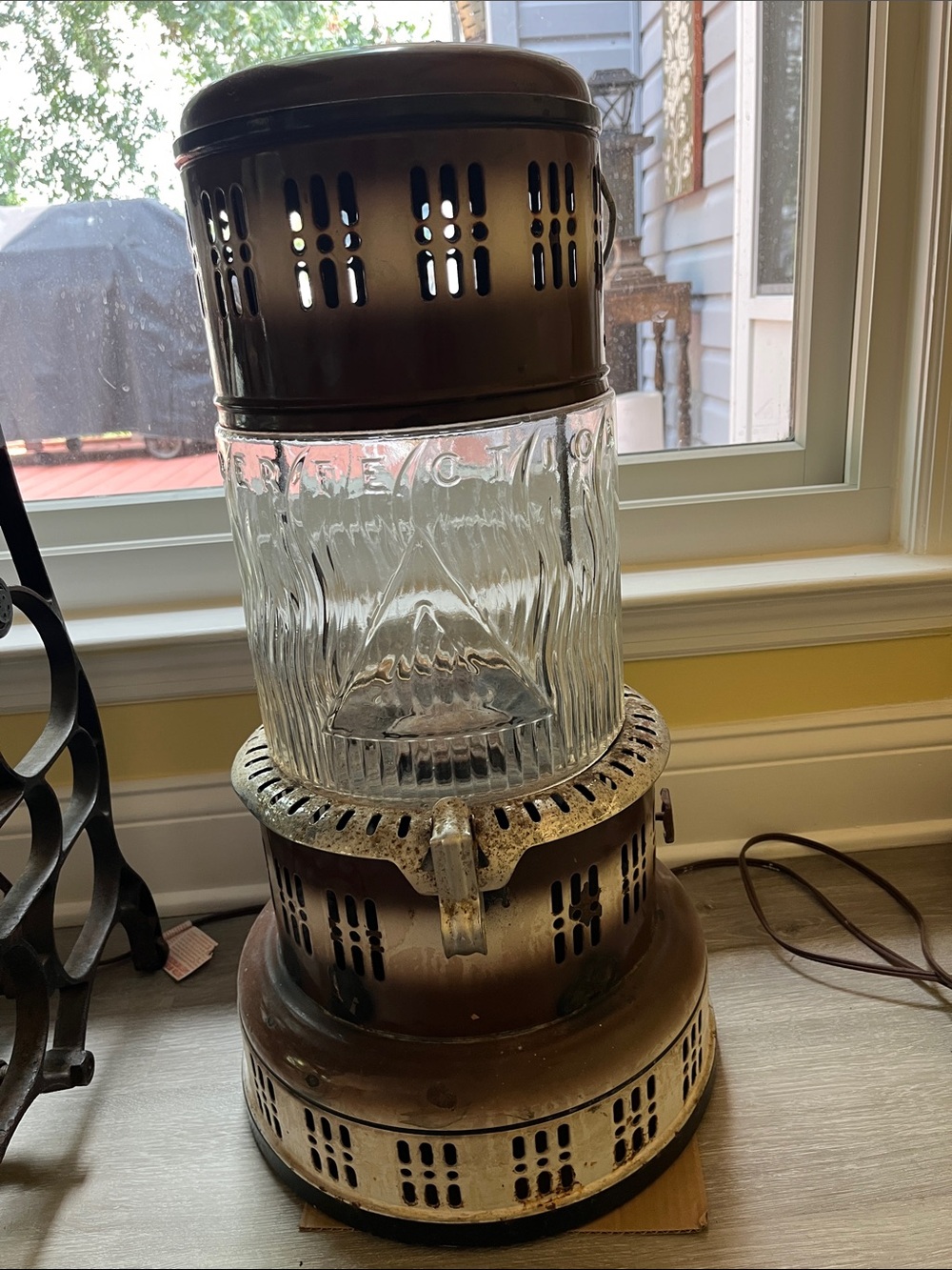 Antique Perfection Brown Metal and Clear Glass stove